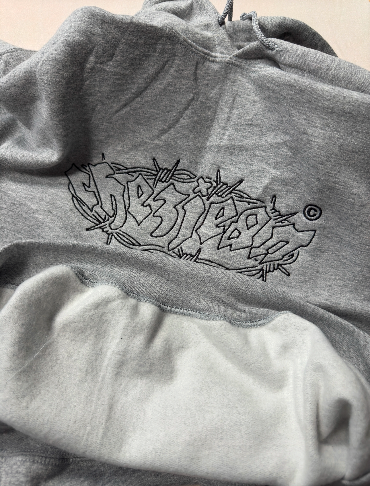 grey chez jean logo hoody