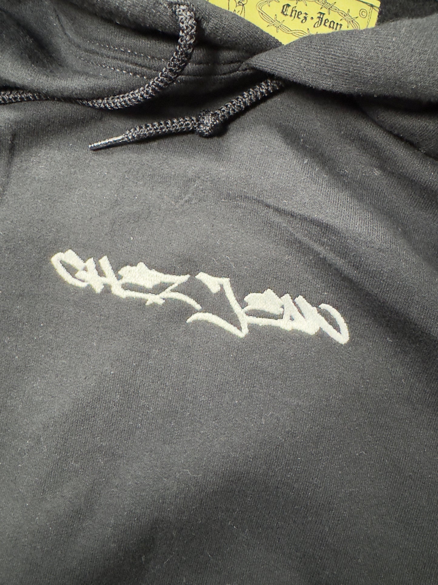 black chez jean writtin logo hoody