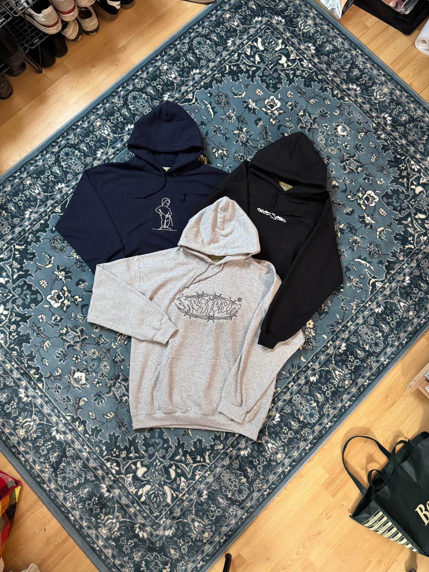 black chez jean writtin logo hoody